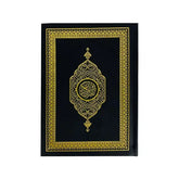 Zwarte Koran met gouden ornamentatie en suède leren kaft in pocketformaat